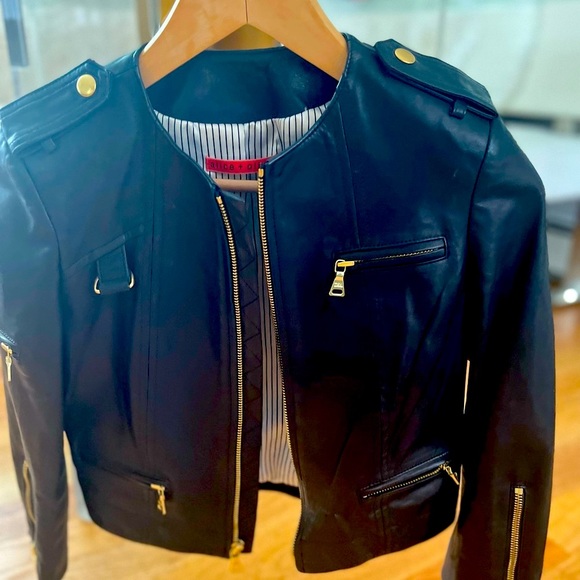 Black cropped Alice & Olivia leather jacket .